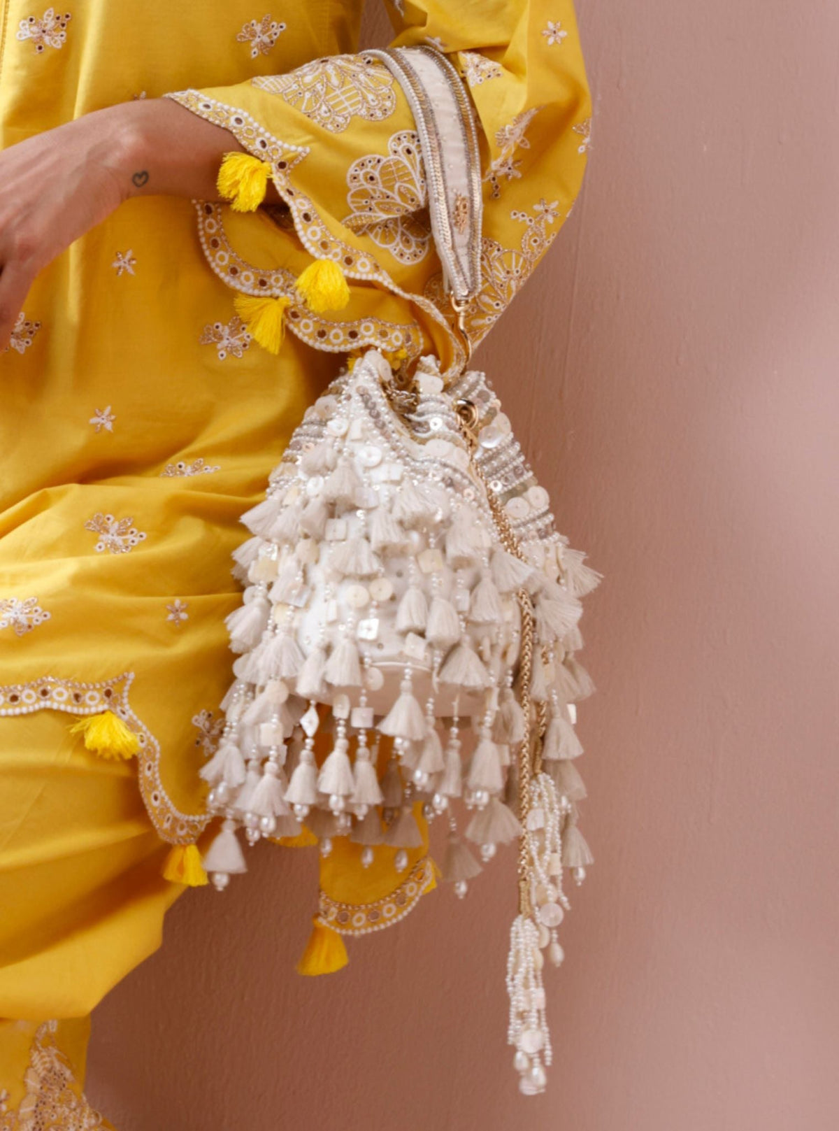 Summer Breeze White Tassels Potli Bag